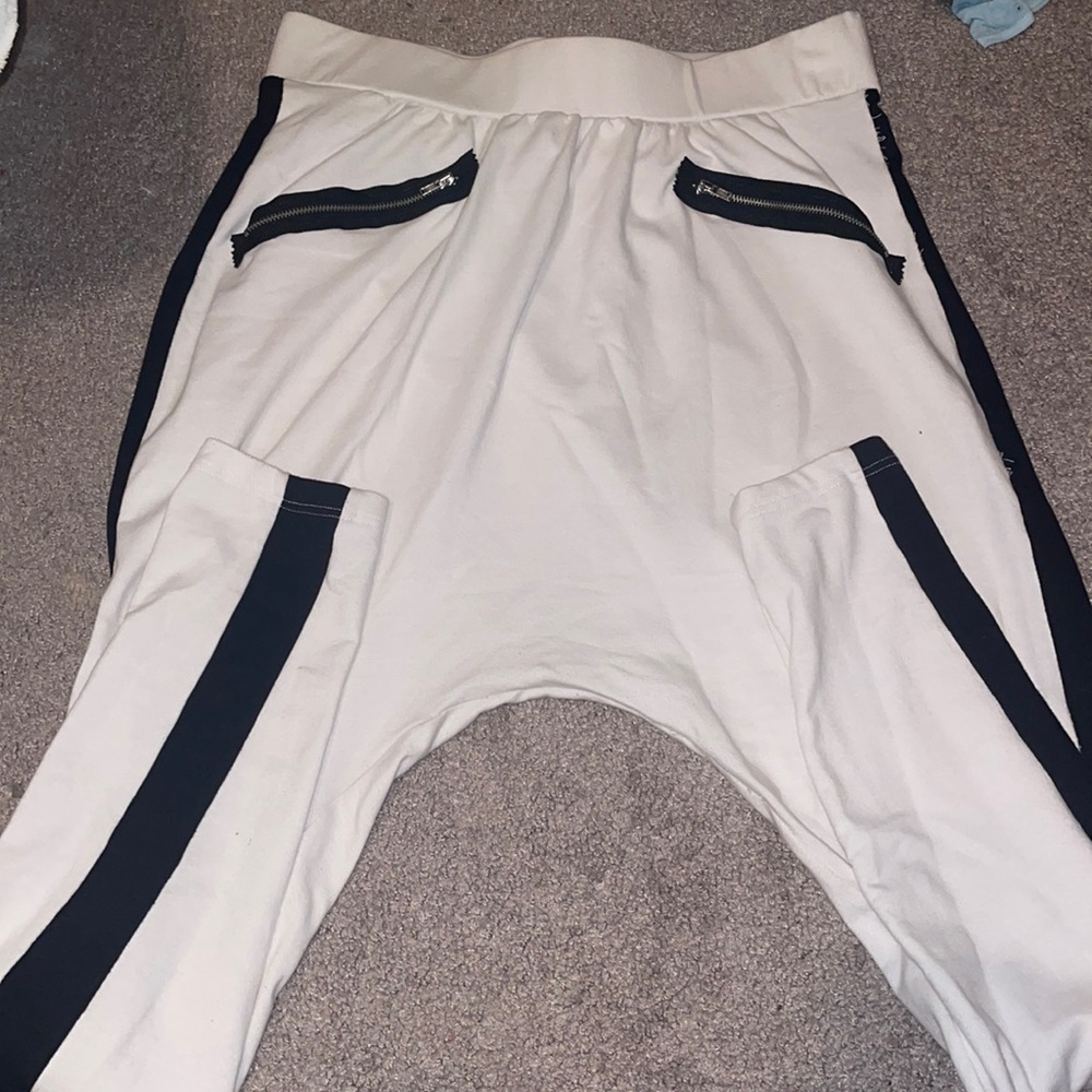 White sweatpants. Low crotch